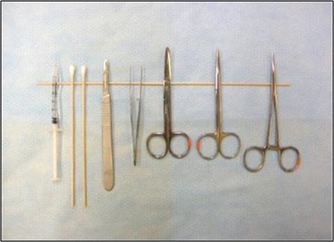 Medical instruments including a syringe, cotton swabs, scalpel, tweezers, and assorted scissors arranged in a row on a light blue surface.